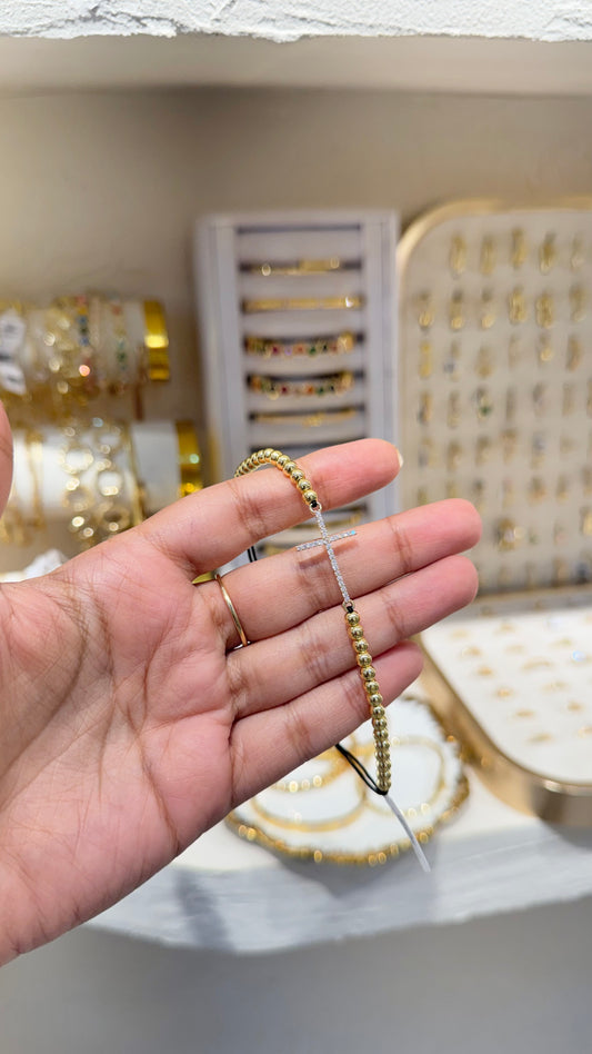 PULSERA CRUZ DELGADA