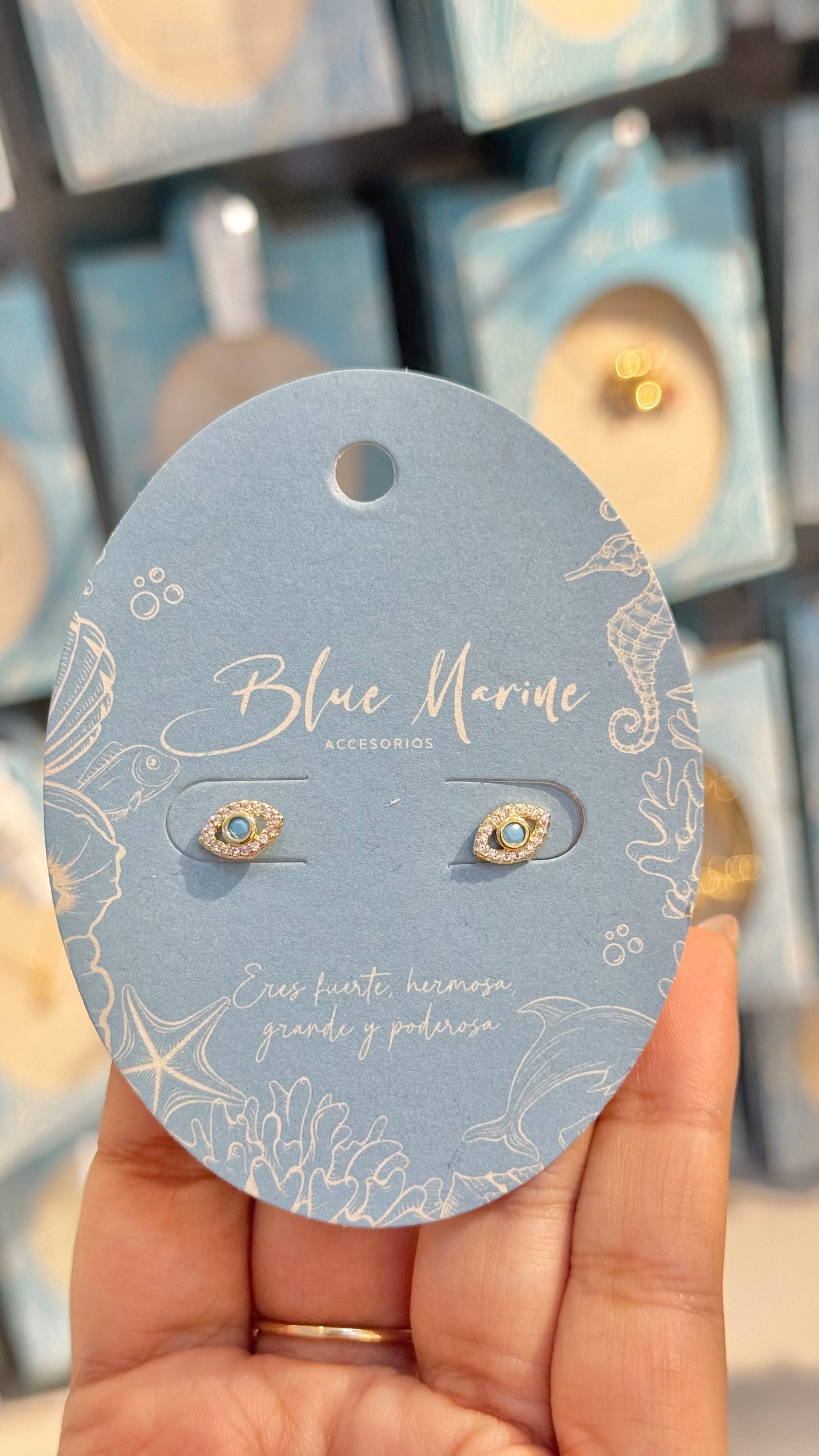 TOPO OJO AZUL ORO LAMINADO
